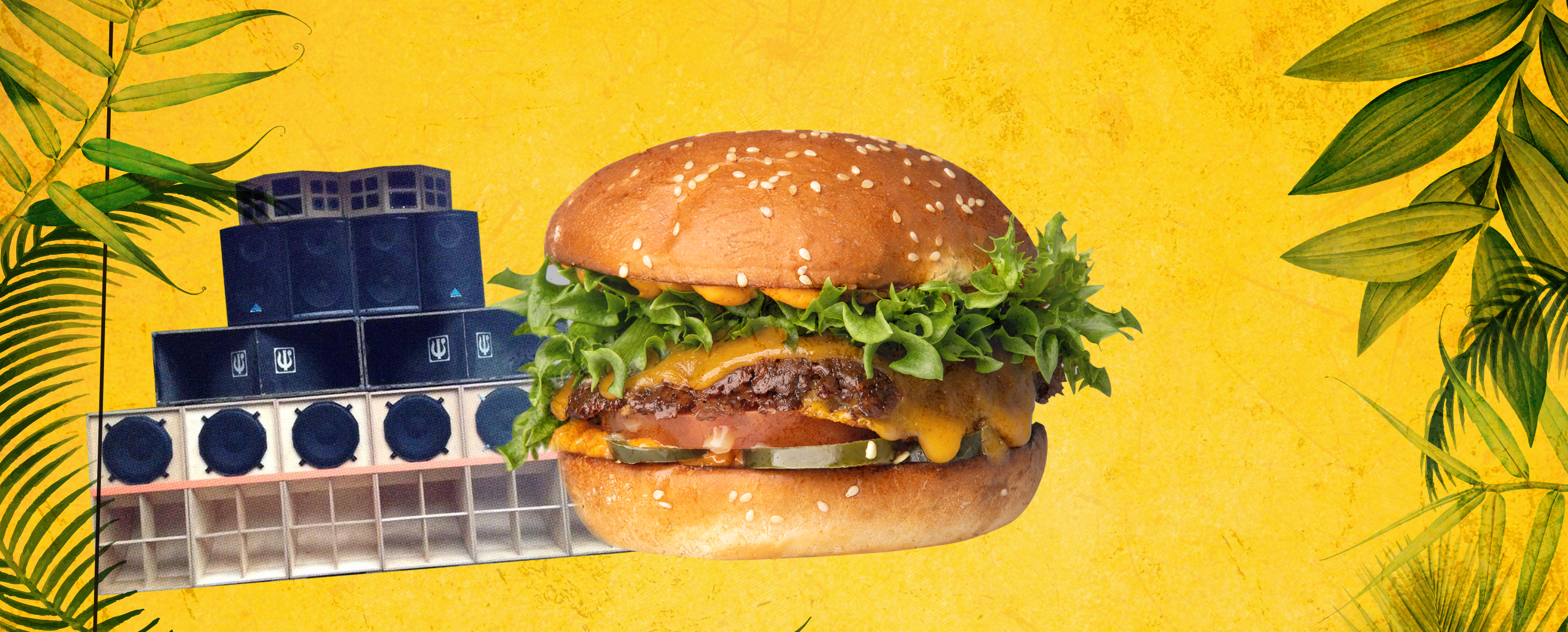 Kuvassa kaiuttimet ja burgeri keltaisella taustalla